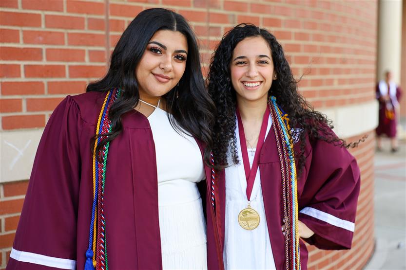 Graduates wearing maroon robes